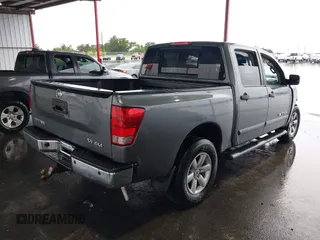 2014 Nissan Titan S with VIN 1N6AA0ECXEN504034, listed as a IAAI auction lot 39883492 with 189,529 mi miles and . Bid and sale history available at DreamBid. Image 4.
