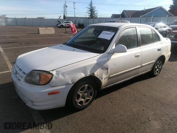 2004 Hyundai Accent GL with VIN KMHCG45C04U498939, listed as a IAAI auction lot 41384821 with 247,994 mi miles. Bid and sale history available at carsss.com. Image 2.