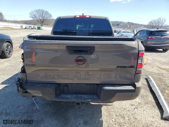 2024 Nissan Frontier PRO-4X with VIN 1N6ED1EK7RN610467, listed as a Copart auction lot 50138015 with 24,723 mi miles and Salvage Title. Bid and sale history available at carsss.com. Image 6.