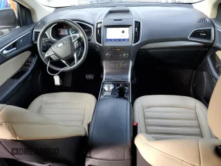 2020 Ford Edge SEL с VIN 2FMPK3J94LBA92154, выставлен на аукционе Copart как лот 65060385 с пробегом 150 187 миль миль и Чистый • Clean title. История ставок и продаж доступна на DreamBid. Изображение 8.