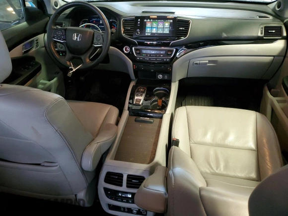 2020 Honda Pilot Touring 7-Passenger z VIN 5FNYF6H67LB031880, wystawiony jako Copart lot #46083925 z przebiegiem 59 729 mil mil oraz Szkoda całkowita • Salvage title. Historia ofert i sprzedaży dostępna na DreamBid. Obrazek 8.