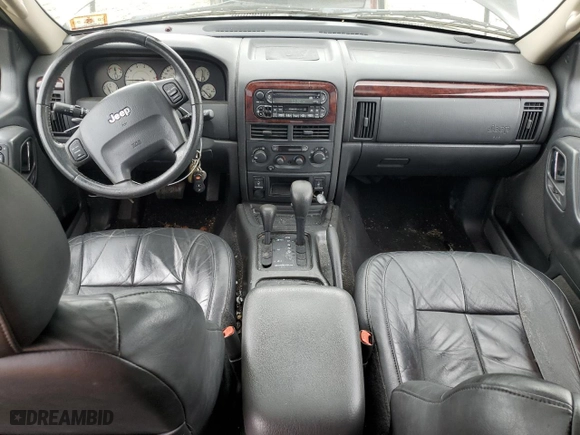 2003 Jeep Grand Cherokee Limited with VIN 1J4GW58N73C569810, listed as a Copart auction lot 57643474 with 123,294 mi miles and Clean Title. Bid and sale history available at carsss.com. Image 8.