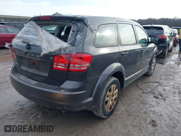 2015 Dodge Journey American Value with VIN 3C4PDCAB5FT557177, listed as a IAAI auction lot 41726815 with 142,658 mi miles and . Bid and sale history available at DreamBid. Image 4.