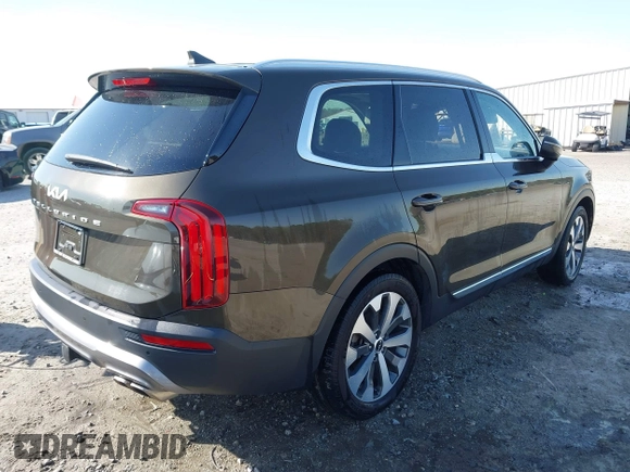 2022 Kia Telluride EX with VIN 5XYP34HCXNG289594, listed as a IAAI auction lot 41812433 with 91,110 mi miles and . Bid and sale history available at DreamBid. Image 4.