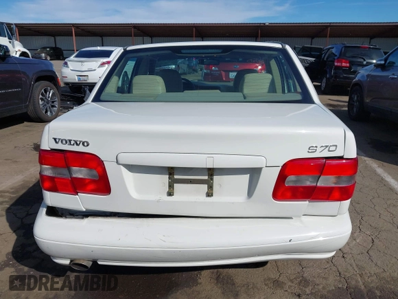 1999 Volvo S70 z VIN YV1LS55A8X1580392, wystawiony jako IAAI lot #41623528 z przebiegiem 77 806 mil mil oraz . Historia ofert i sprzedaży dostępna na DreamBid. Obrazek 16.
