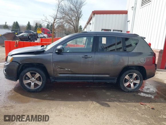 2016 Jeep Compass High Altitude Edition with VIN 1C4NJCEA4GD806920, listed as a IAAI auction lot 41163826 with 129,104 mi miles. Bid and sale history available at carsss.com. Image 14.