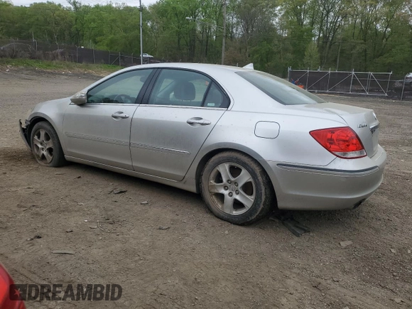2006 Acura RL with VIN JH4KB16506C011002, listed as a Copart auction lot 53621895 with 171,105 mi miles and Salvage Title. Bid and sale history available at DreamBid. Image 2.