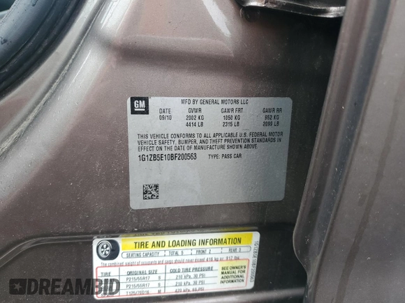 2011 Chevrolet Malibu 1LS with VIN 1G1ZB5E10BF200563, listed as a Copart auction lot 56359625 with 130,820 mi miles and Salvage Title. Bid and sale history available at DreamBid. Image 12.