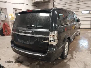 2016 Chrysler Town & Country Touring with VIN 2C4RC1BG1GR165957, listed as a IAAI auction lot 41937581 with 156,769 mi miles. Bid and sale history available at carsss.com. Image 4.