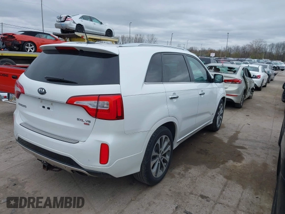 2014 Kia Sorento SX with VIN 5XYKWDA7XEG489258, listed as a IAAI auction lot 42004637 with 95,904 mi miles. Bid and sale history available at carsss.com. Image 4.