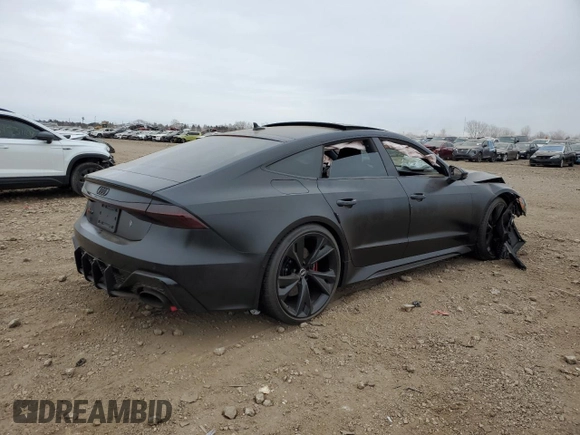 2021 Audi RS 7 z VIN WUAPCBF28MN901560, wystawiony jako Copart lot #84767714 z przebiegiem Nie podano mil oraz Szkoda całkowita • Salvage title. Historia ofert i sprzedaży dostępna na DreamBid. Obrazek 3.