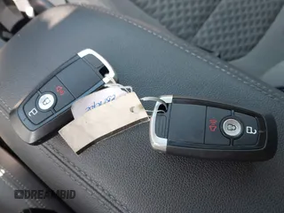 2020 Ford Escape SE z VIN 1FMCU9G67LUA85265, wystawiony jako IAAI lot #42389104 z przebiegiem 66 608 mil mil oraz . Historia ofert i sprzedaży dostępna na DreamBid. Obrazek 11.