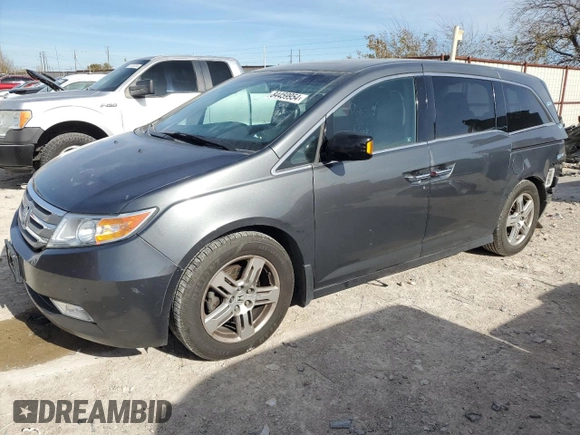2012 Honda Odyssey Touring with VIN 5FNRL5H96CB122785, listed as a Copart auction lot 84459954 with 114,208 mi miles and Salvage Title. Bid and sale history available at carsss.com. Image 1.