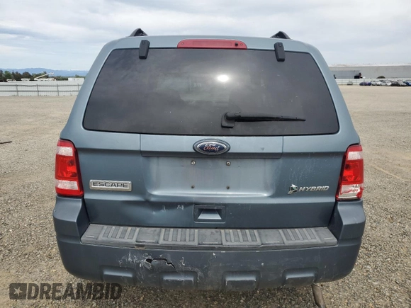 2010 Ford Escape Hybrid z VIN 1FMCU4K35AKB31202, wystawiony jako Copart lot #52922525 z przebiegiem 152 303 mil mil oraz Szkoda całkowita • Salvage title. Historia ofert i sprzedaży dostępna na DreamBid. Obrazek 6.