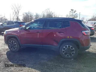 2020 Jeep Compass Trailhawk with VIN 3C4NJDDB2LT239384, listed as a IAAI auction lot 41527372 with 56,122 mi miles and . Bid and sale history available at carsss.com. Image 14.