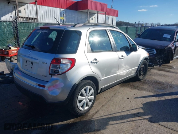2010 Suzuki SX4 z VIN JS2YB5A3XA6300488, wystawiony jako IAAI lot #41121293 z przebiegiem 232 931 mil mil oraz . Historia ofert i sprzedaży dostępna na DreamBid. Obrazek 4.