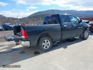 2011 Ram 1500 SLT with VIN 1D7RV1GT0BS510165, listed as a IAAI auction lot 41661885 with 173,319 mi miles. Bid and sale history available at carsss.com. Image 4.