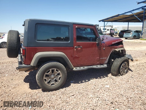 2010 Jeep Wrangler Rubicon with VIN 1J4BA6D14AL167077, listed as a Copart auction lot 54233795 with 148,638 mi miles and Salvage title. Bid and sale history available at DreamBid. Image 3.