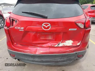 2015 Mazda CX-5 Touring with VIN JM3KE4CYXF0439953, listed as a IAAI auction lot 42124197 with 242,614 mi miles and . Bid and sale history available at DreamBid. Image 6.