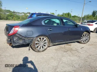 2014 Lincoln MKS EcoBoost z VIN 1LNHL9FT8EG607807, wystawiony jako Copart lot #57755915 z przebiegiem 203 316 mil mil oraz Szkoda całkowita • Salvage title. Historia ofert i sprzedaży dostępna na DreamBid. Obrazek 3.