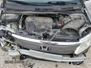2013 Honda Odyssey LX z VIN 5FNRL5H24DB054216, wystawiony jako Copart lot #59871675 z przebiegiem 103 494 mil mil oraz Czysty tytuł • Clean title. Historia ofert i sprzedaży dostępna na DreamBid. Obrazek 12.