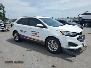 2019 Ford Edge SEL with VIN 2FMPK3J98KBC43110, listed as a Copart auction lot 54412115 with 80,685 mi miles and Salvage title. Bid and sale history available at DreamBid. Image 4.
