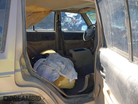 1999 Jeep Cherokee SE with VIN 1J4FF28S5XL520501, listed as a IAAI auction lot 41706800 with Not provided miles and . Bid and sale history available at DreamBid. Image 8.