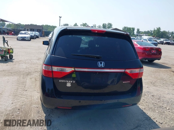 2011 Honda Odyssey Touring with VIN 5FNRL5H97BB073708, listed as a IAAI auction lot 42409164 with 141,986 mi miles and . Bid and sale history available at DreamBid. Image 16.
