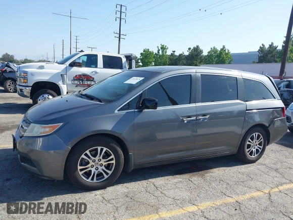 2011 Honda Odyssey EX-L with VIN 5FNRL5H64BB070836, listed as a IAAI auction lot 42520878 with 162,316 mi miles and . Bid and sale history available at DreamBid. Image 14.