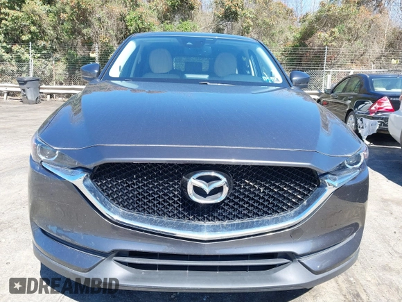 2017 Mazda CX-5 Touring with VIN JM3KFBCL2H0203497, listed as a IAAI auction lot 41860782 with 65,482 mi miles. Bid and sale history available at carsss.com. Image 12.