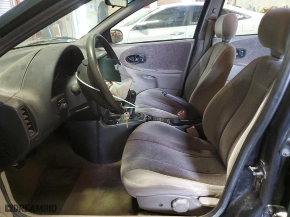 1997 Saturn SL with VIN 1G8ZJ5273VZ107990, listed as a Copart auction lot 44818295 with 143,071 mi miles and Clean Title. Bid and sale history available at carsss.com. Image 7.
