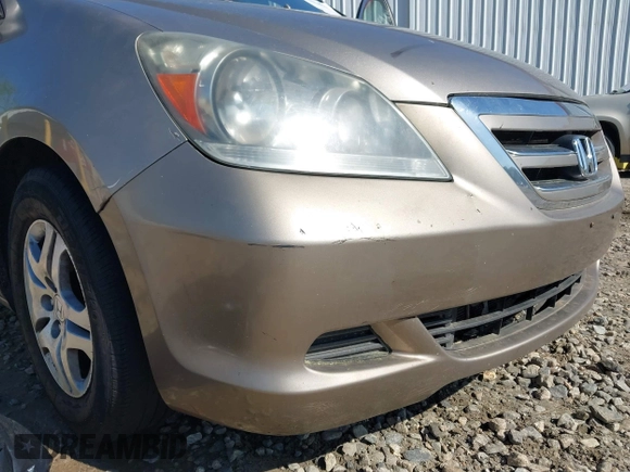 2006 Honda Odyssey EX-L with VIN 5FNRL38666B410188, listed as a IAAI auction lot 42004957 with 156,584 mi miles. Bid and sale history available at carsss.com. Image 6.