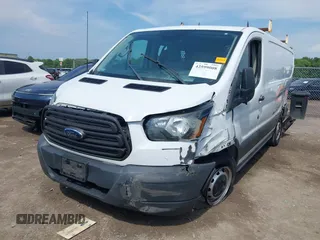 2016 Ford Transit Cargo with VIN 1FTYE1ZM6GKA84050, listed as a IAAI auction lot 42599008 with 135,943 mi miles and . Bid and sale history available at DreamBid. Image 2.