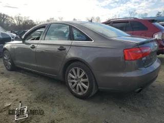 2015 Audi A6 2.0T Premium with VIN WAUFFAFC3FN013656, listed as a Copart auction lot 85963424 with 102,568 mi miles and Salvage Title. Bid and sale history available at carsss.com. Image 2.