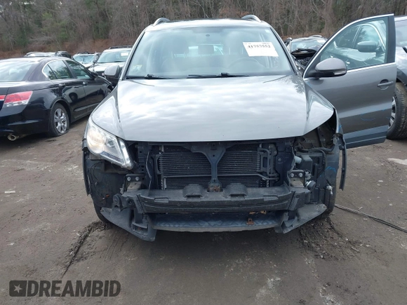 2011 Volkswagen Tiguan SE with VIN WVGBV7AX4BW532524, listed as a IAAI auction lot 41757552 with 141,115 mi miles and . Bid and sale history available at DreamBid. Image 6.