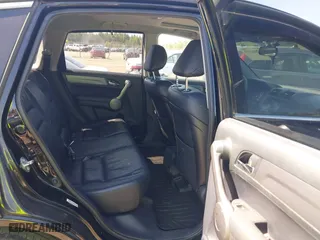 2009 Honda CR-V EX-L with VIN JHLRE48799C012129, listed as a IAAI auction lot 42016110 with 141,819 mi miles. Bid and sale history available at carsss.com. Image 8.