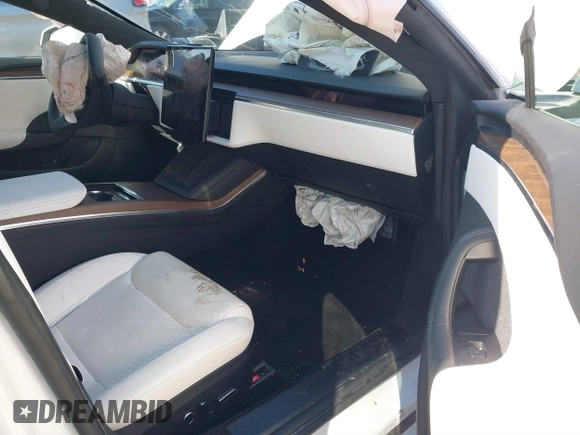 2022 Tesla Model S with VIN 5YJSA1E51NF491493, listed as a IAAI auction lot 41570494 with Not Provided miles and . Bid and sale history available at DreamBid. Image 5.