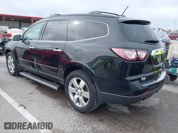2014 Chevrolet Traverse LTZ with VIN 1GNKRJKD1EJ203282, listed as a IAAI auction lot 41984380 with 219,819 mi miles and . Bid and sale history available at DreamBid. Image 3.
