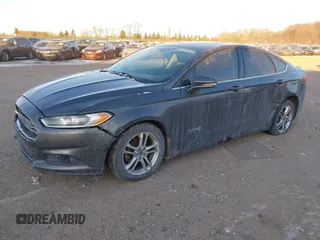 2015 Ford Fusion SE Hybrid with VIN 3FA6P0LU1FR219908, listed as a IAAI auction lot 41272688 with 310,452 mi miles. Bid and sale history available at carsss.com. Image 18.