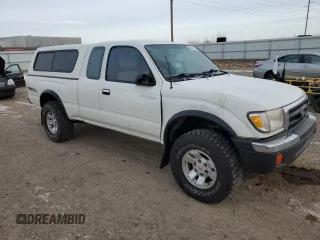 1998 Toyota Tacoma with VIN 4TAWN72N8WZ113174, listed as a Copart auction lot 84641064 with 148,221 mi miles and Salvage Title. Bid and sale history available at DreamBid. Image 4.