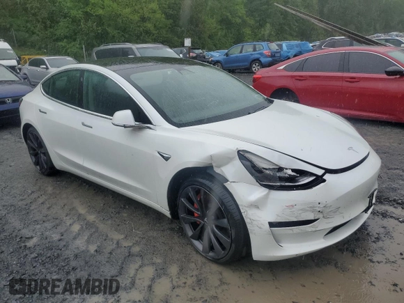 2020 Tesla Model 3 Performance z VIN 5YJ3E1EC9LF784594, wystawiony jako Copart lot #56179955 z przebiegiem 97 419 mil mil oraz Szkoda całkowita • Salvage title. Historia ofert i sprzedaży dostępna na DreamBid. Obrazek 4.