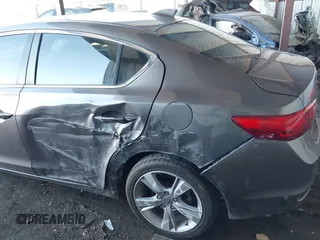 2014 Acura ILX Premium with VIN 19VDE1F51EE006621, listed as a IAAI auction lot 41984539 with 165,585 mi miles and . Bid and sale history available at DreamBid. Image 6.