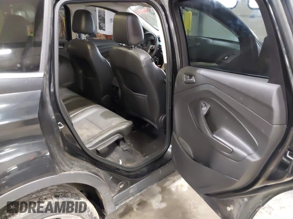 2015 Ford Escape SE with VIN 1FMCU9G9XFUA70029, listed as a IAAI auction lot 41673827 with 82,043 mi miles. Bid and sale history available at carsss.com. Image 8.
