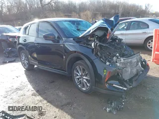 2021 Mazda CX-5 Grand Touring with VIN JM3KFBDM0M1357587, listed as a IAAI auction lot 41680245 with 1 mi miles. Bid and sale history available at carsss.com. Image 1.