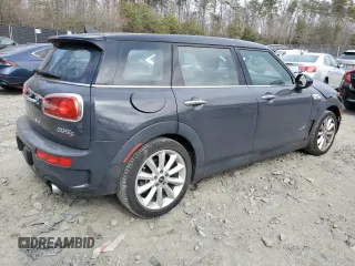 2017 MINI Clubman Cooper S with VIN WMWLU5C57H2E82584, listed as a Copart auction lot 48861365 with 90,418 mi miles and Salvage Title. Bid and sale history available at DreamBid. Image 3.