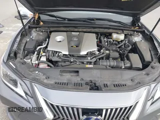 2019 Lexus ES 300h with VIN JTHB21B19K2022809, listed as a IAAI auction lot 42484103 with 62,596 mi miles and . Bid and sale history available at DreamBid. Image 10.