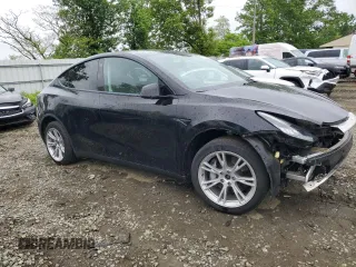 2022 Tesla Model Y Long Range z VIN 7SAYGDEE2NF313492, wystawiony jako Copart lot #55748695 z przebiegiem Nie podano mil oraz Szkoda całkowita • Salvage title. Historia ofert i sprzedaży dostępna na DreamBid. Obrazek 4.