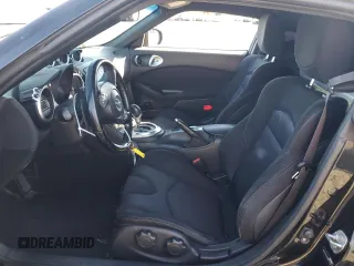 2012 Nissan 370Z Touring with VIN JN1AZ4EH4CM561432, listed as a Copart auction lot 89376935 with 128,955 mi miles and Salvage Title. Bid and sale history available at carsss.com. Image 7.