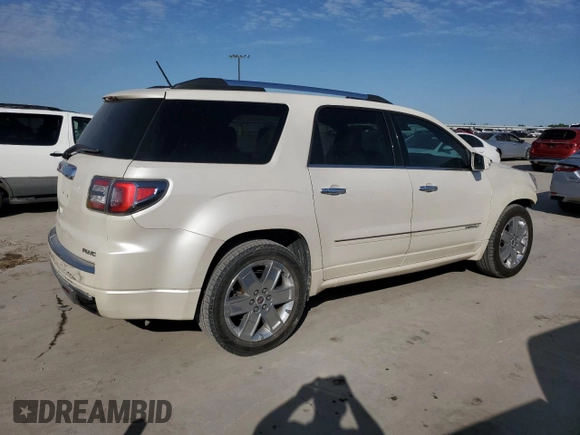 2014 GMC Acadia Denali z VIN 1GKKVTKD2EJ358735, wystawiony jako Copart lot #52299545 z przebiegiem 192 817 mil mil oraz Czysty tytuł • Clean title. Historia ofert i sprzedaży dostępna na DreamBid. Obrazek 3.