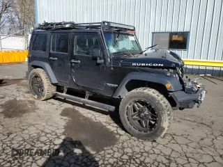 2014 Jeep Wrangler Unlimited Rubicon with VIN 1C4BJWFG1EL195612, listed as a Copart auction lot 47749415 with 35,878 mi miles and Salvage Title. Bid and sale history available at carsss.com. Image 4.